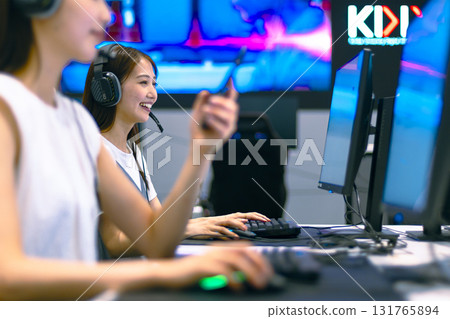 E-sports woman playing online games E-sports woman playing online games 131765894