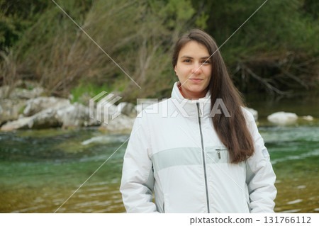 Natural Portrait of 30-Year-Old Brunette Woman Outdoors Without Makeup Natural Portrait of 30-Year-Old Brunette Woman Outdoors Without Makeup 131766112