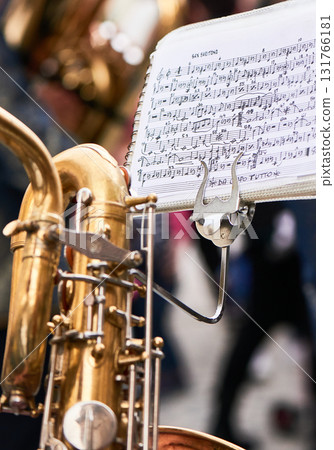 Saxophone and musical score Saxophone and musical score 131766181