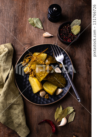 Bowl of pickled marinated cucumbers 131766726