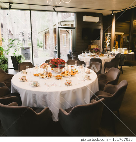 A sophisticated venue prepared for a corporate event, business conference, or formal gala. 131767033