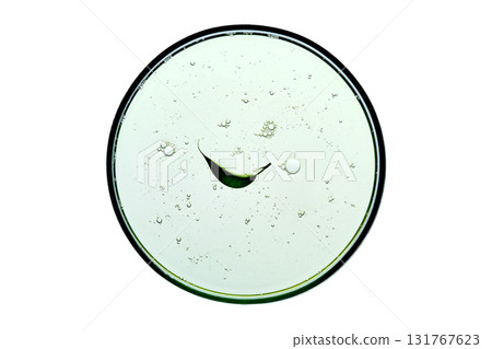 Cosmetic gel in a petri dish with a leaf. Cosmetic gel in a petri dish with a leaf. 131767623