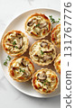 Photorealistic Chicken and Mushroom Tartlets on White Plate, Elegant Food Photography 131767776