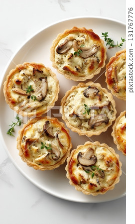 Photorealistic Chicken and Mushroom Tartlets on White Plate, Elegant Food Photography 131767776