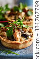 Photorealistic Chicken and Mushroom Tartlets on White Plate, Elegant Food Photography 131767799