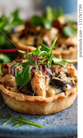 Photorealistic Chicken and Mushroom Tartlets on White Plate, Elegant Food Photography 131767799
