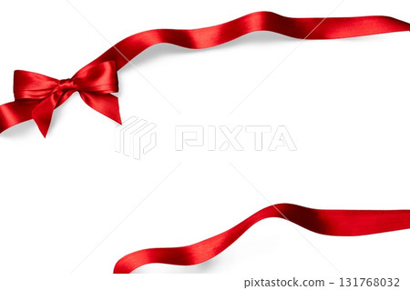 Elegant red satin ribbon tied in a bow, isolated on white background. Ideal for holiday design, gift wrapping and celebration templates. 131768032