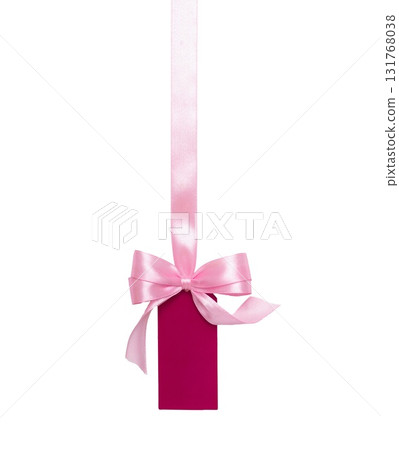 Pink satin ribbon with bow and attached gift tag isolated on white background. Ideal for packaging, gifts, labels and sale promotions. Pink satin ribbon with bow and attached gift tag isolated on white background. Ideal for packaging, gifts, labels and sale promotions. 131768038
