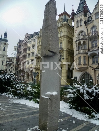 City streets, Baroque buildings, and a colonnade in winter. Snow creates a special atmosphere in the spa town. 131768056