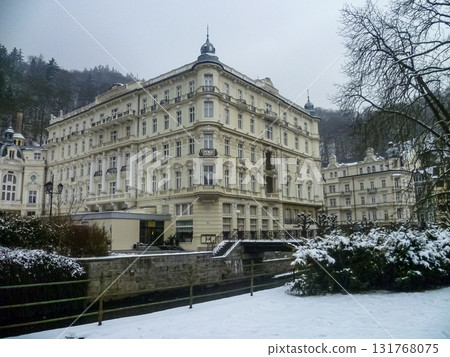 City streets, Baroque buildings, and a colonnade in winter. Snow creates a special atmosphere in the spa town. City streets, Baroque buildings, and a colonnade in winter. Snow creates a special atmosphere in the spa town. 131768075