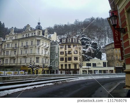 City streets, Baroque buildings, and a colonnade in winter. Snow creates a special atmosphere in the spa town. City streets, Baroque buildings, and a colonnade in winter. Snow creates a special atmosphere in the spa town. 131768076