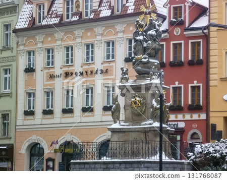 City streets, Baroque buildings, and a colonnade in winter. Snow creates a special atmosphere in the spa town. 131768087