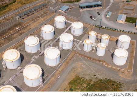 Aerial view of industrial oil storage tanks and piping infrastructure Aerial view of industrial oil storage tanks and piping infrastructure 131768365