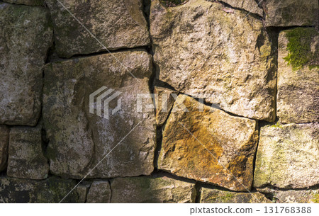 Wall made of large, rough stones Wall made of large, rough stones 131768388