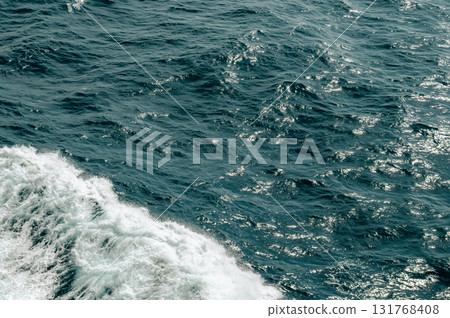 Abstract blue sea water with white wave for background. High quality photo Abstract blue sea water with white wave for background. High quality photo 131768408