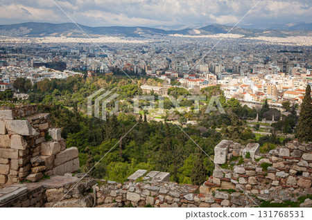 A view of the ruins at the Ancient Agora of Athens site, with the Temple of Hephaestus at the far side of the archeological site. High quality photo A view of the ruins at the Ancient Agora of Athens site, with the Temple of Hephaestus at the far side of the archeological site. High quality photo 131768531