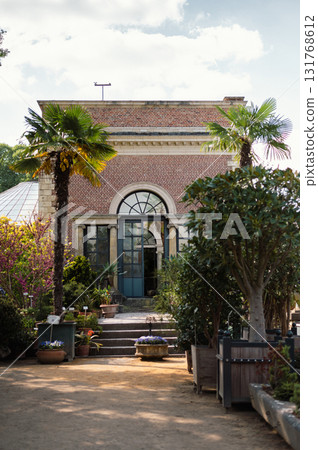 Historic botanical garden in Leuven, Belgium, featuring rare plants, serene paths, and beautiful greenhouses. Historic botanical garden in Leuven, Belgium, featuring rare plants, serene paths, and beautiful greenhouses. 131768612
