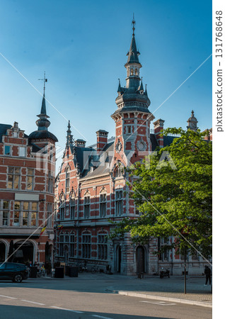 Leuven, Belgium - April 26, 2025: Town Hall in Leuven, Belgium, known as the longest bar in the world, with historic buildings and vibrant atmosphere. 131768648