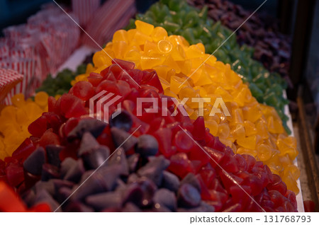 A cuberdon, a cone-shaped Belgian candy. It is also known in dutch as a neus, Ghent nose, or neuzeke (little nose) and in french as chapeau-de-pretre (priest's hat). 131768793