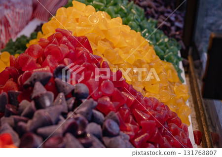 A cuberdon, a cone-shaped Belgian candy. It is also known in dutch as a neus (nose), Gentse neus (Ghent nose), or neuzeke (little nose) and in french as chapeau-de-pretre (priest's hat) A cuberdon, a cone-shaped Belgian candy. It is also known in dutch as a neus (nose), Gentse neus (Ghent nose), or neuzeke (little nose) and in french as chapeau-de-pretre (priest's hat) 131768807