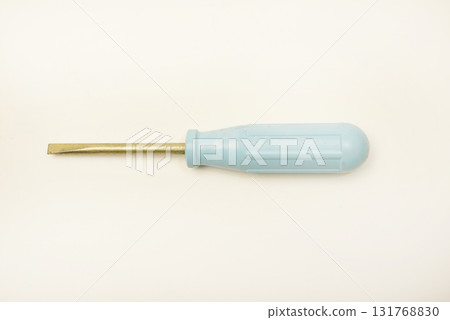 A light blue phillips screwdriver on a white background. A hand tool. 131768830