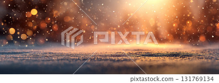 Snowy surface with falling snow and blurred forest in warm sunlight Snowy surface with falling snow and blurred forest in warm sunlight 131769134