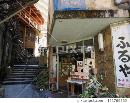 A shop nestled deep in an alley - Furuya and the stairs at Tsuetate Onsen 131769263