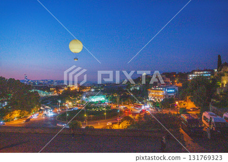 View on Old Town and rHIKE PARK IN TWILIGHT in Tbilisiu View on Old Town and rHIKE PARK IN TWILIGHT in Tbilisiu 131769323