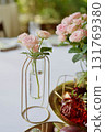 Red decorative vase in the shape of a pomegranate. Wedding table d cor. Gold and white 131769380