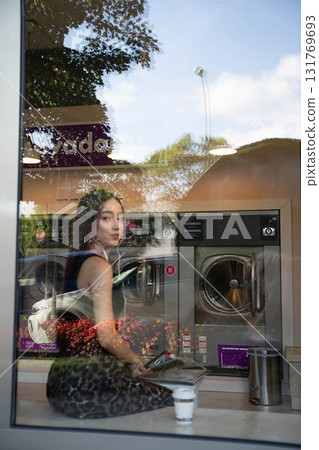 Young Woman Reflected Reading Young Woman Reflected Reading 131769693