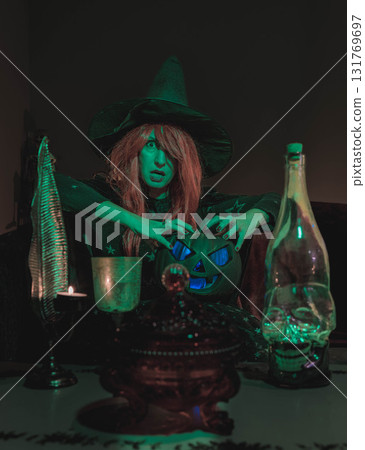 Witch with Halloween Pumpkin Doing Magic Witch with Halloween Pumpkin Doing Magic 131769697