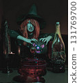 Witch with Halloween Pumpkin Doing Magic 131769700