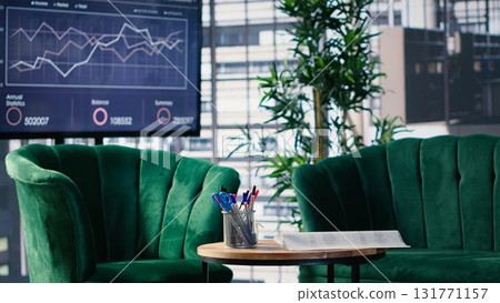 Clean empty office setup with modern furniture emphasizing preparation for a business conference, lighting, table and structured layout supporting professional workplace standards. Office life. 131771157