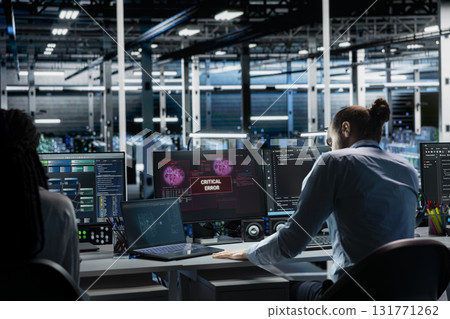 Teamworking data center admins try to fix malfunctions using AI tools. Server farm IT specialists doing brainstorming to optimize system health, repairing critical error with artificial intelligence 131771262
