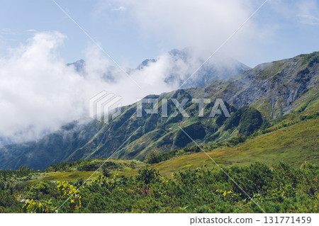 Clouds rising over Mt. Nishi-Tomine with Mt. Goryu in the background / From Happoone, Hakuba Village, Nagano Prefecture, September 131771459