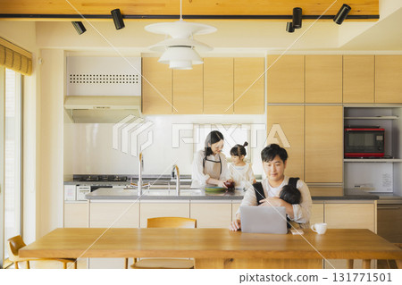 Dad working in the living room 131771501