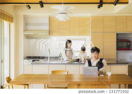 Dad working in the living room 131771502