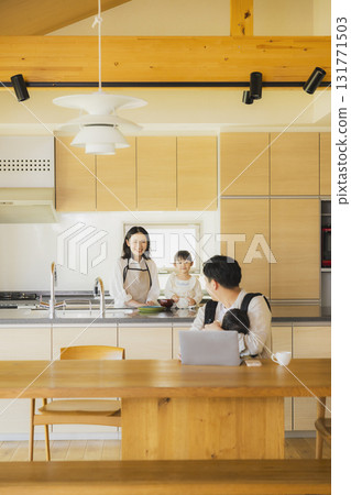 Dad working in the living room Dad working in the living room 131771503