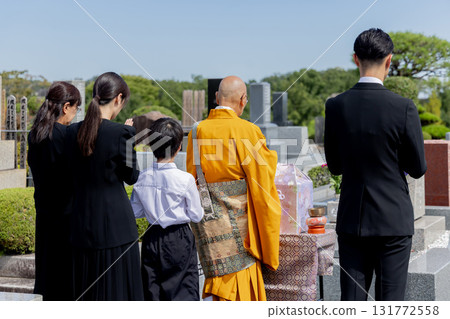 Bereaved family attending the bone-laying ceremony 131772558