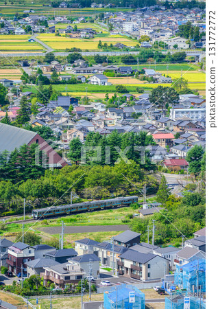 [Oito Line] A train running through the city [Matsumoto City] 131772772