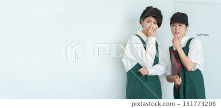 Part-time staff having a secret conversation Part-time staff having a secret conversation 131773208