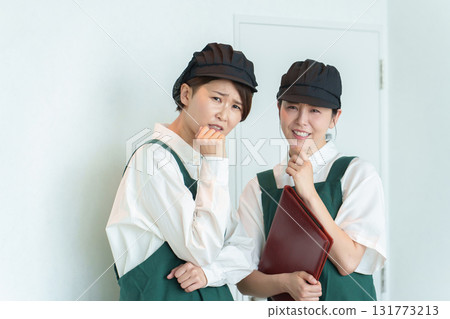 Part-time staff having a secret conversation Part-time staff having a secret conversation 131773213