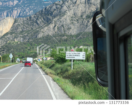 View from the bus heading from Barcelona to Andorra, mountain road, sunny day in May View from the bus heading from Barcelona to Andorra, mountain road, sunny day in May 131773336