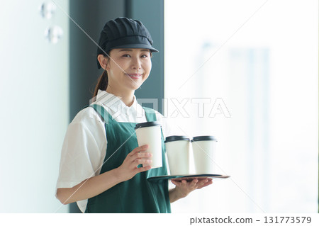 Woman working at a cafe, cafe clerk, part-time job, portrait 131773579