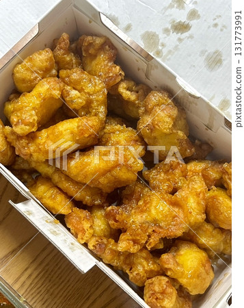 Crispy fried chicken with golden, crunchy skin and juicy, tender meat. A delicious and savory dish, perfect for any meal, served with dipping sauces or side dishes for extra flavor! 131773991
