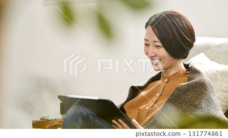 Videophone Woman operating tablet 131774861