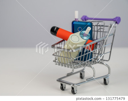 Electronic cigarette and disposable vape in a shopping cart. Tobacco heating systems and vaporizer. 131775479