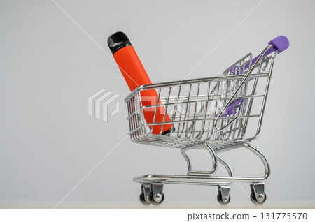 Disposable vape in a customer's cart. 131775570