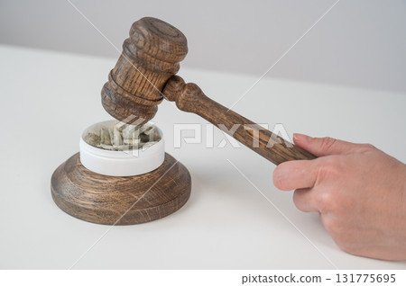 Judge Bangs Gavel. Chewing Tobacco Ban.  Judge Bangs Gavel. Chewing Tobacco Ban.  131775695
