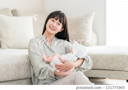 Young Asian woman holding a baby (mother, mom, childcare, parenting, childbirth) Young Asian woman holding a baby (mother, mom, childcare, parenting, childbirth) 131775905